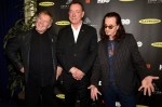 Inductees Rush arrive at the 2013 Rock and Roll Hall of Fame induction ceremony in Los Angeles